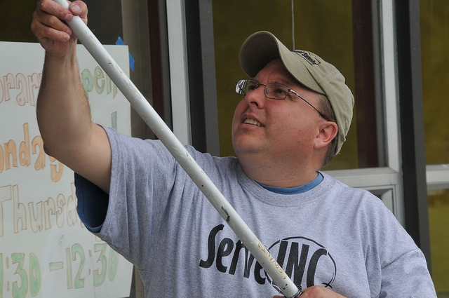 ServeINC Volunteer painting at Lafayette